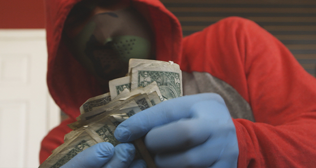 違法賭博と金 (原題: Illegal Gambling)の写真